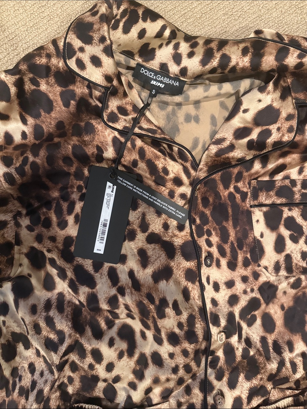 SKIMS Leopard Print Satin Pajama Set in Brown and Black - Picture 2 of 4